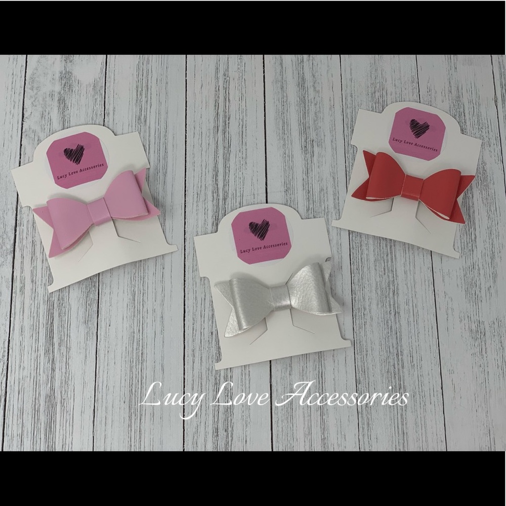 Handmade set of three leather bow hair clips!